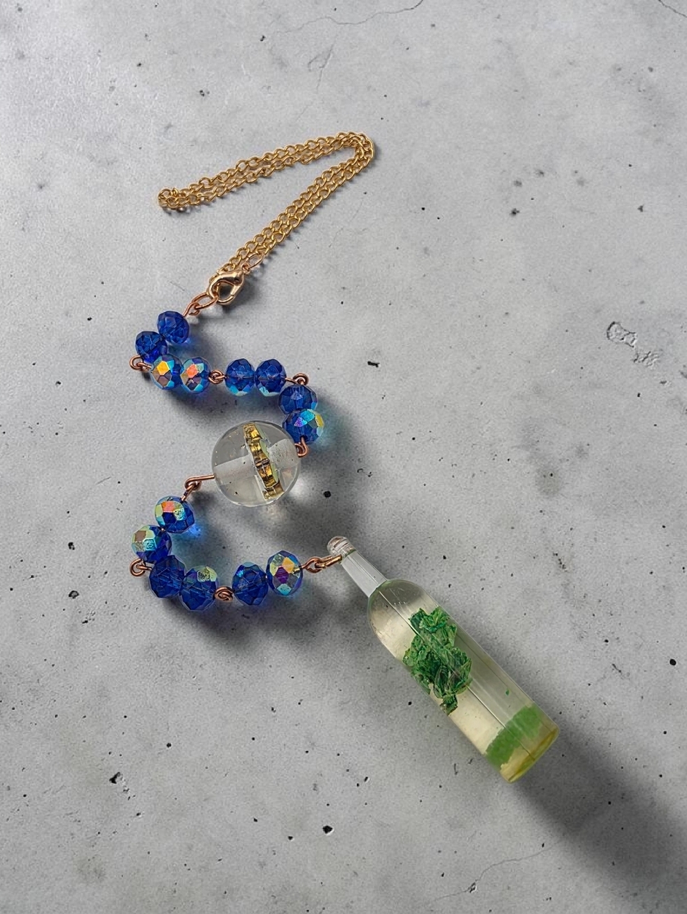 Handcrafted Blue Crystal and Resin Bottle Car Charm